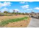 Dog park with grass, shade structures, and seating areas at 2300 Trasimeno Pl, Henderson, NV 89044