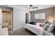 Bedroom featuring neutral walls, carpet, a window with blinds, a bed, and a ceiling fan at 262 Calvino Ave, Las Vegas, NV 89183