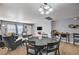 Inviting dining area with a round table, seating, and views into the living room at 262 Calvino Ave, Las Vegas, NV 89183