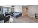 Cozy living room features plush sectional sofa, ceiling fan, and neutral color palette at 262 Calvino Ave, Las Vegas, NV 89183