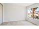 Cozy bedroom with neutral carpet and a window view at 2632 Cathedral Ln, Las Vegas, NV 89108