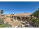 Aerial view showcasing the home's backyard with covered patio and outdoor fountain feature at 2783 Cherrydale Falls Dr, Henderson, NV 89052