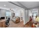 Cozy living area featuring wood floors and neutral wall paint at 3026 English Palmer Rd, North Las Vegas, NV 89086