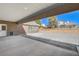 Covered patio looking out on a spacious backyard offering lots of room to play or garden at 3196 Mateuse St, Logandale, NV 89021