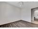 A bright bedroom featuring hardwood floors, ceiling fan and recessed lighting at 3196 Mateuse St, Logandale, NV 89021