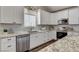 Bright kitchen features modern appliances and granite counter tops at 3196 Mateuse St, Logandale, NV 89021