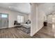 Cozy living room with modern decor and lots of natural light with beautiful floors at 3196 Mateuse St, Logandale, NV 89021