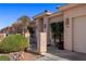 Attractive home exterior with a manicured lawn and desert landscaping enhancing the curb appeal at 328 Vineyard Ln, Mesquite, NV 89027