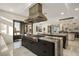 This is a well-equipped kitchen with a large cooktop island and stainless steel appliances at 333 Highview Ridge Ave, Las Vegas, NV 89138