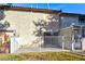 Backyard with a covered patio and white iron fence at 3339 Duece St, Las Vegas, NV 89121