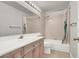Neutral bathroom featuring a shower-tub combo and vanity at 3505 Tuscany Village Dr, Las Vegas, NV 89129