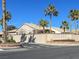Tuscany Village entrance with its brick walls and lush greenery offers a charming welcome at 3505 Tuscany Village Dr, Las Vegas, NV 89129