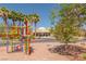 Durango Hills Community Center framed by colorful art installation and towering palm trees at 3505 Tuscany Village Dr, Las Vegas, NV 89129