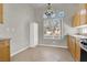 Eat-in kitchen featuring a large window and neutral tones at 3505 Tuscany Village Dr, Las Vegas, NV 89129