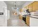 Bright kitchen featuring stainless steel appliances and ample cabinetry at 3505 Tuscany Village Dr, Las Vegas, NV 89129