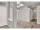 Bright living room with modern lighting and fresh paint at 3505 Tuscany Village Dr, Las Vegas, NV 89129