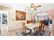 Traditional dining room with decorative rug under table with chairs and light fixture at 3620 Bahama Bay Ct, Las Vegas, NV 89147