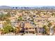 Exterior view of home in community from above with other similar homes at 3620 Bahama Bay Ct, Las Vegas, NV 89147