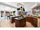 Spacious kitchen featuring two islands, granite countertops, and a pot rack overhead at 3620 Bahama Bay Ct, Las Vegas, NV 89147