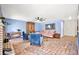 Bright living room with tiled floor, a ceiling fan, neutral walls, and comfortable furnishings at 3620 Bahama Bay Ct, Las Vegas, NV 89147