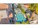 Aerial view of pool and hot tub with mature desert landscaping in backyard at 3620 Bahama Bay Ct, Las Vegas, NV 89147