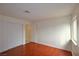 Corner view of bedroom with wood flooring, closet, and window at 3630 Willow Springs Dr, Las Vegas, NV 89103