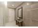 Hallway with contemporary console table, mirror, and a white front door at 3722 Las Vegas Blvd # 1712, Las Vegas, NV 89158