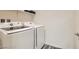 Convenient laundry area with newer model, white Samsung washer and dryer at 3772 Brilliant Sunset St, Las Vegas, NV 89129