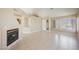 Bright living room featuring tile flooring, fireplace and lots of natural light at 4016 Fairport Dr, North Las Vegas, NV 89032