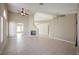 Spacious living room features tile flooring, fireplace, and lots of natural light at 4016 Fairport Dr, North Las Vegas, NV 89032