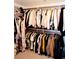 Walk-in closet with lots of hanging clothes at 425 Donner Pass Dr, Henderson, NV 89014