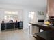 Kitchen area with stainless steel appliances, granite countertops, and a breakfast bar at 425 Donner Pass Dr, Henderson, NV 89014