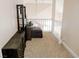 Neutral colored loft area showcasing a bookshelf, desk, and sitting area with carpet flooring at 425 Donner Pass Dr, Henderson, NV 89014