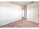 Bedroom featuring neutral carpet and a closet at 4542 Townwall St, Las Vegas, NV 89115