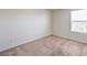 Bedroom with neutral carpet and a window at 4542 Townwall St, Las Vegas, NV 89115