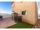 Enclosed backyard with turf, storage shed, and ample space for outdoor enjoyment at 4786 Valleyside Ave, Las Vegas, NV 89115