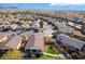 Aerial view of a residential neighborhood with single-Gathering homes and mountain views at 4790 Toscana Pl, Pahrump, NV 89061