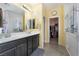 Bathroom featuring double sinks, a walk-in closet and a walk-in shower at 4790 Toscana Pl, Pahrump, NV 89061