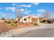 Charming single-story home featuring desert landscaping and a neutral color palette at 4790 Toscana Pl, Pahrump, NV 89061