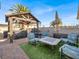 Outdoor gazebo area with a table and chairs at 5200 Valley Glen St, Las Vegas, NV 89119