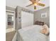 Bedroom featuring a twin sized bed, closet, and ceiling fan at 5200 Valley Glen St, Las Vegas, NV 89119