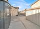 Exterior shot of a metal shed and basketball hoop on a concrete driveway and backyard at 5200 Valley Glen St, Las Vegas, NV 89119