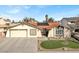 Charming single-story home featuring a well-manicured lawn and two-car garage at 5200 Valley Glen St, Las Vegas, NV 89119