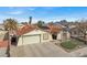 Inviting one-story home with a two-car garage and a beautifully landscaped front yard at 5200 Valley Glen St, Las Vegas, NV 89119