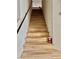 Wooden stairs leading up with a safety handrail at 5320 Tartan Hill Ave, Las Vegas, NV 89141