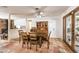 Comfortable dining room with tile flooring, and views of the backyard at 5715 Gilbert Ln, Las Vegas, NV 89130