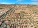 Expansive aerial view of a Las Vegas neighborhood showcasing rows of single-Gathering homes at 5971 Sonoma Station Ave, Las Vegas, NV 89139