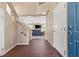 Inviting foyer with tile flooring, a staircase, and a view into the spacious living area at 5971 Sonoma Station Ave, Las Vegas, NV 89139