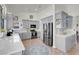 Bright kitchen features gray cabinets, stainless steel appliances, and a breakfast bar at 6109 Flaming Arrow Rd, North Las Vegas, NV 89031