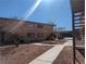 Exterior shot of apartment building with landscaping, stairs, and walkways at 615 S Royal Crest Cir # 15, Las Vegas, NV 89169